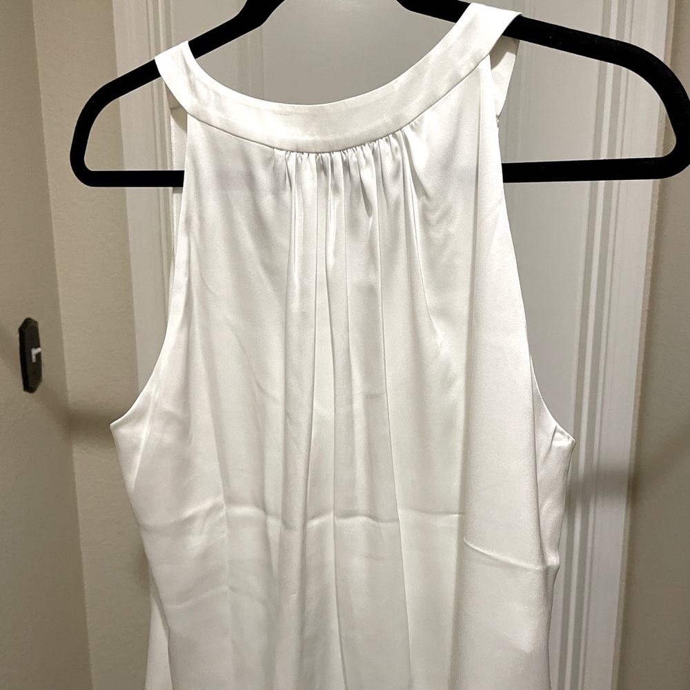 Brand New without tags White sleeveless top with interior bra shelf